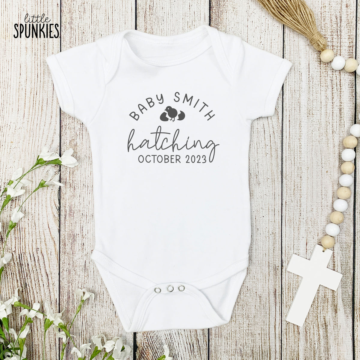 Baby Last Name Hatching with Date Onesies® Brand