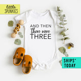 And Then There Were Three Baby Reveal Onesie